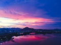 Aerial drone view beautiful twilignt sky after sunset over bay and town. Aerial view twilignt sky over Phuket beach, Thailand Royalty Free Stock Photo