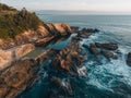 Aerial drone view of Blue Pool in Bermagui during sunrise sunset with blue sky and reflection. New South Wales