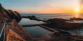 Aerial drone view of Blue Pool in Bermagui during sunrise sunset with blue sky and reflection. New South Wales