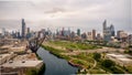 Aerial drone view of a boat sailing on the Chicago river under a bridge Royalty Free Stock Photo