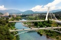 Aerial drone view of cable stayed Millennium bridge, footpath bridge and Moraca river in Podgorica, Montenegro Royalty Free Stock Photo