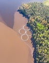 Aerial drone view of circle sea fish farm cages and round fishing nets, farming salmon, trout and cod, feeding the fish a forage, Royalty Free Stock Photo