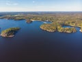 Aerial drone view of circle sea fish farm cages and round fishing nets, farming salmon, trout and cod, feeding the fish a forage, Royalty Free Stock Photo