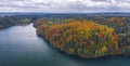 Aerial Drone view of colorful top of the forest and a lake at Autumn Royalty Free Stock Photo