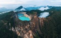 Aerial Drone view of Danau volcano Kelimutu in Ende. Sunrise. Colorful crater lake. East Nusa Tenggara Aerial view Royalty Free Stock Photo