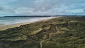 aerial drone view of the dunes of Tramore, Waterford Ireland. Sandhills natural park