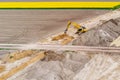 Aerial drone view on excavator working on building site Royalty Free Stock Photo