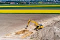 Aerial drone view on excavator working on building site Royalty Free Stock Photo