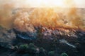 Aerial drone view of fire or wildfire in forest with huge smoke clouds, burning dry trees and grass Royalty Free Stock Photo