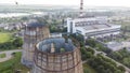 Aerial drone view flight near thermal power plant. Cooling towers of CHP