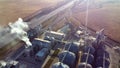 Aerial Drone View Flight Over complex of grain elevator buildings. Royalty Free Stock Photo