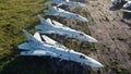 Aerial drone view flight over old rusty broken plane aircraft. Royalty Free Stock Photo