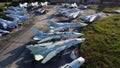 Aerial drone view flight over old rusty broken plane aircraft. Royalty Free Stock Photo