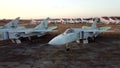 Aerial drone view flight over parking lot of old dismantled aircraft. Cemetery