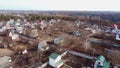 Aerial Drone View Flight Over small brick houses with plot of land in the middle