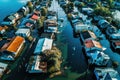 Aerial drone view of flooded homes during flood event - AI Generated