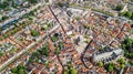 Aerial drone view of Gauda town cityscape from above, typical Dutch city skyline with canals and houses, Holland, Netherlands Royalty Free Stock Photo