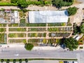 Aerial Drone View of Greenhouse or Hothouse near the Highway in the City. Birds Eye View.