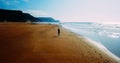 Aerial Drone View Of Healthy Sportive Woman Running On Beach