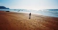 Aerial Drone View Of Healthy Sportive Woman Running On Beach