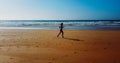 Aerial Drone View Of Healthy Sportive Woman Running On Beach