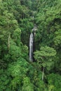 Aerial drone view hidden waterfall in jungle rainforest. Wild untouched nature