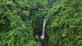 Aerial drone view hidden waterfall in jungle rainforest. Wild untouched nature