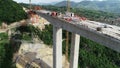 Aerial drone view on highway bridge road under construction. Construction of the viaduct on the modern new road. Royalty Free Stock Photo