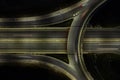 Aerial drone view of highway junction. Roundabout cars moving fast. Transportation infrastructure Royalty Free Stock Photo