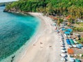 Aerial drone view of Holiday In Sanur Beach, Bali, Indonesia with ocean, boats, beach, villas, and people Royalty Free Stock Photo