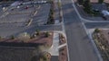 Aerial Drone view of Ivins St George in Utah on a bright sunny winter day showing city in front of red mountains and red cliff nat