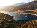 Aerial Drone View of Kas Marina Dock Pier with Small Boats and Yachts in Antalya Turkey. Royalty Free Stock Photo