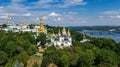 Aerial drone view of Kiev Pechersk Lavra churches on hills from above, cityscape of Kyiv city, Ukraine