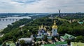 Aerial drone view of Kiev Pechersk Lavra churches on hills from above, cityscape of Kyiv city, Ukraine