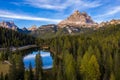 Aerial drone view of Lake Antorno (Lago di Antorno) located in Dolomites area, Belluno Province, Italy. Lake Antorno, Three Peaks Royalty Free Stock Photo