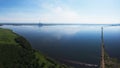 Aerial drone view of lake landscape with road