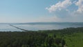 Aerial drone view of lake landscape with road