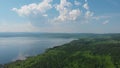 Aerial drone view of lake landscape with road