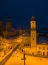 Aerial drone view of leaning clock tower in Banska Bystrica during christmass morning