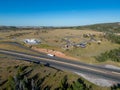 Aerial drone view of Lincoln Memorial rest stop on Interstate 80 near Laramie Wyoming under blue sky Royalty Free Stock Photo