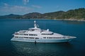 Aerial drone view of luxurious boat on the sea near tropical Kata Noi Beach area in Phuket Royalty Free Stock Photo