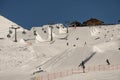 Aerial drone view of Madonna di Campiglio Trentino and ursus snowpark in Val Rendena dolomites Italy in winter Royalty Free Stock Photo