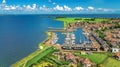Aerial drone view of Marken island, traditional fisherman village, typical Dutch landscape, North Holland, Netherlands