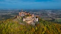 Aerial drone view of medieval Hohenzollern castle on top of hill in autumn, Baden-Wurttemberg, Germany. Royalty Free Stock Photo