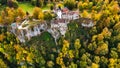 Aerial drone view medieval Lichtenstein castle on mountain, autumn Baden-Wurttemberg, Germany.