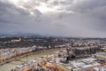 Aerial drone view of Monchsberg and mirabelle park by Salzach river in snowy winter in Salzburg Austria