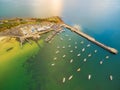 Aerial drone view of Mornington Pier and Yacht club with moored