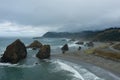 Aerial view of a northwest Pacific shoreline on a rainy, cloudy day in Oregon, United Sates