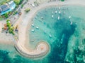 Aerial drone view of ocean, boats, beach, shore In Sanur Beach, Bali, Indonesia with with Traditional Balinese Fishing Boats Royalty Free Stock Photo