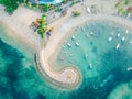 Aerial drone view of ocean, boats, beach, shore In Sanur Beach, Bali, Indonesia with with Traditional Balinese Fishing Boats Royalty Free Stock Photo